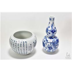 Blue and white dual dragon gourd scholar vase purportedly 19th century 9 1/2" in height and a blue a