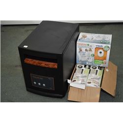 Edenpure space heater, working at time of cataloguing, four Veap surge protector/bed bug traps and a