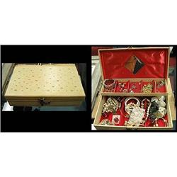 Lot of costume jewelry in a large vinta