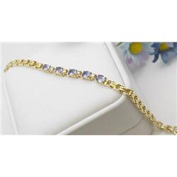 Ladys bracelet tanzanite five 5x4mm wi