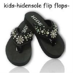 KIDS/Black hide with spur rowel concho in middle/Crystals and studs throughout strap/Thick rubber so
