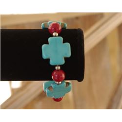 TURQOISE STONE STRETCH BRACELET/RED BEAD ACCENT