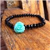 Image 1 : BLACK BEADED STRETCH BRACELET WITH MINT GREEN ROSE ACCENT