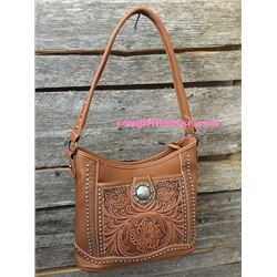Georgeous tooled leather hobo style bag has a silver berry concho on the front flap pocket.Inside si