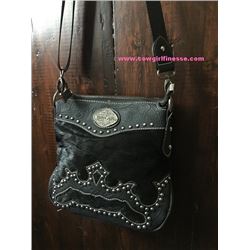 BLACK LEATHER HAIR ON HIDE WESTERN MESSENGER PURSE/ zip and open pocket on the back. Strap is a comf