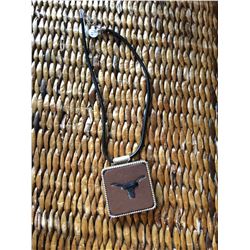 LONG HORN HAIR ON HIDE/BROWN LEATHER CONCHO   21/4"/LEATHER ROPE