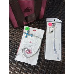 TWO PURSE HOLDERS/ PEACE /CROSS