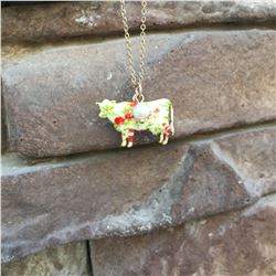 GOLD/ FLORAL COW NECKLACE AND EARRINGS