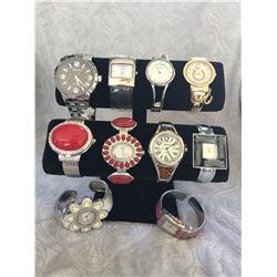 GROUP OF 10 NEW WATCHES  *need new watch batteries