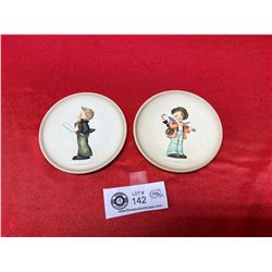 Pair of miniture hummel plates