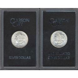 Lot of Two GSA Morgan Dollars: 1883-CC & 1884-CC