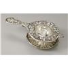 Image 1 : A SHREVE & CO. STERLING TEA STRAINER, C.1884 A Sterling Tea Strainer And Stand