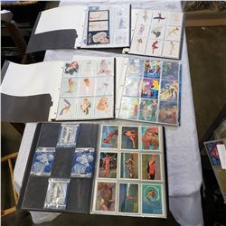 5 BINDERS OF PIN-UP GIRLS SWIMSUIT AND MERMAIDS, AND MERMAID TRADING CARDS