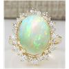 Image 1 : 5.45 CTW Natural Opal And Diamond Ring In 14k Yellow Gold