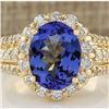 Image 1 : 4.60 CTW Natural Tanzanite And Diamond Ring In 14k Yellow Gold