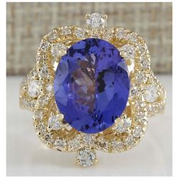 6.47 CTW Natural Blue Tanzanite And Diamond Ring In 18K Yellow Gold