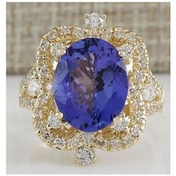 6.47 CTW Natural Blue Tanzanite And Diamond Ring In 14K Yellow Gold