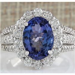 5.46 CTW Natural Blue Tanzanite And Diamond Ring In 18K White Gold