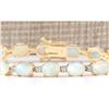 Image 1 : 13.80 CTW Natural Opal And Diamond Bracelet In 18K Yellow Gold