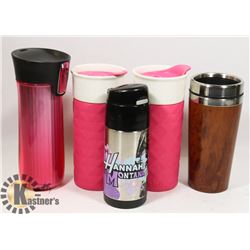 A FLAT OF TRAVEL  CUPS