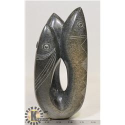 STONE CARVING OF THREE FISH.