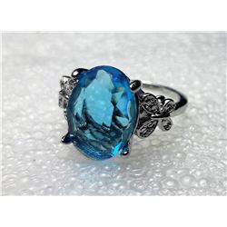 OCEAN BLUE ZIRCON AND WHITE CZ RING, OVAL SHAPED