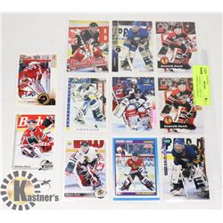 DOMINIK HASEK 11 CARD LOT (BLACKHAWKS AND SABRES)