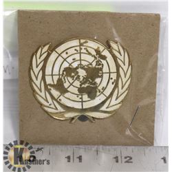 U.N. PEACEKEEPING CAP BADGE
