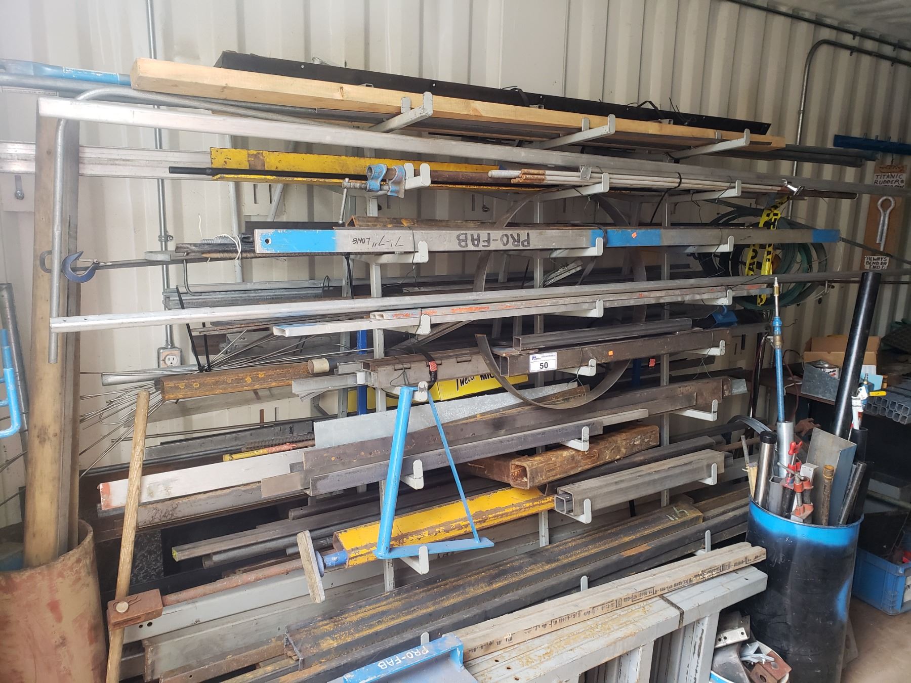 STEEL RACKS WITH ASSORTED MATERIALS