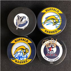 LOT OF 4 SIGNED HOCKEY PUCKS