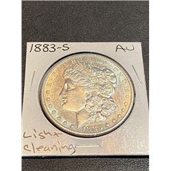 1883 S AU Light Cleaning Morgan Silver Dollar