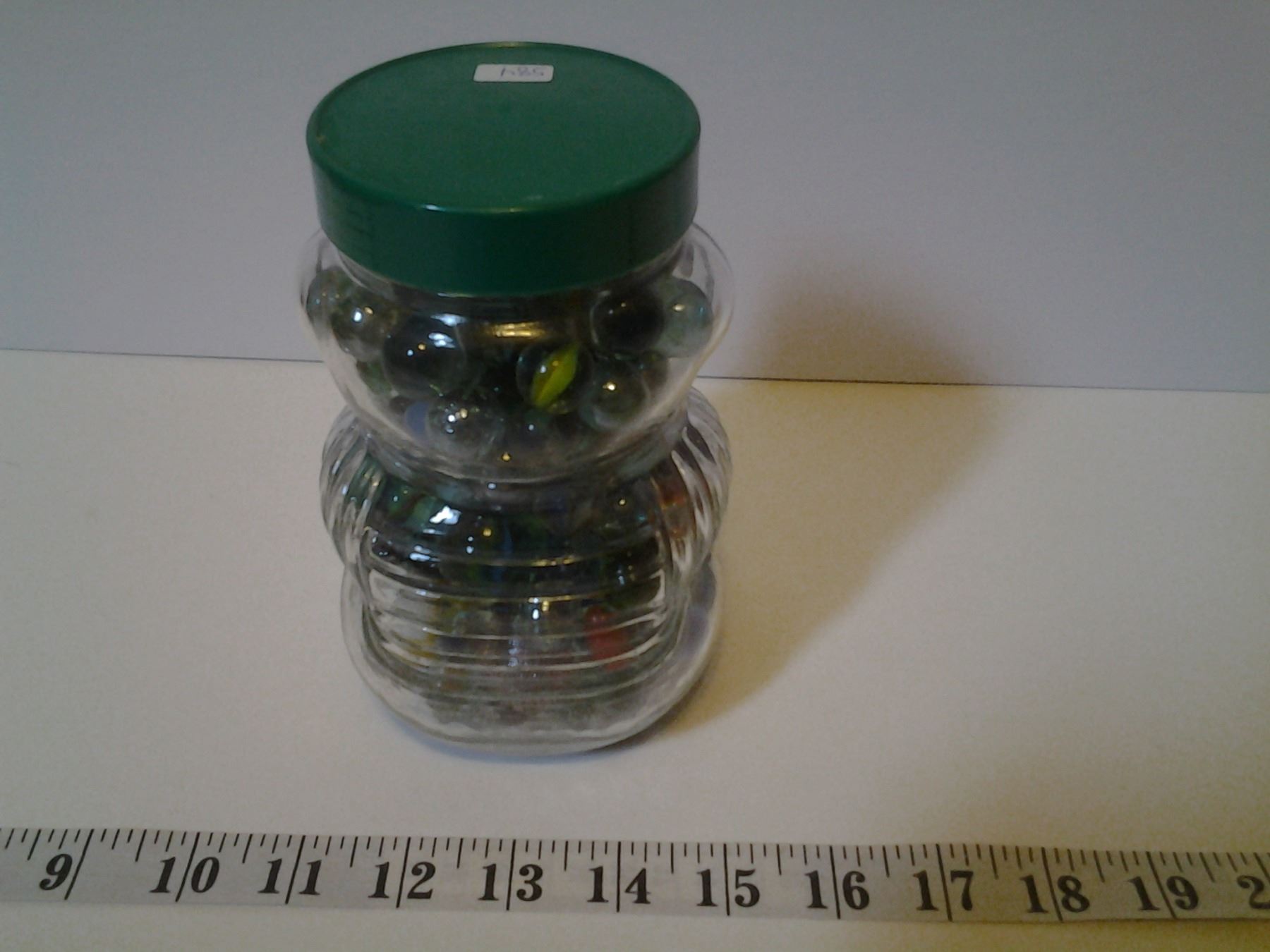 Kraft Peanut Butter Jar Full of Marbles Schmalz Auctions