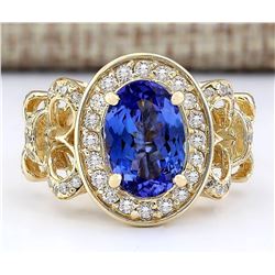3.93 CTW Natural Tanzanite And Diamond Ring In 18K Yellow Gold