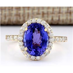 4.30 CTW Natural Tanzanite And Diamond Ring In 18K Yellow Gold