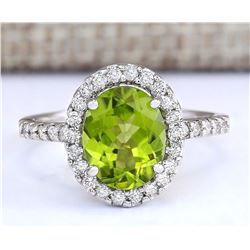 3.03 CTW Natural Peridot And Diamond Ring In 14k White Gold
