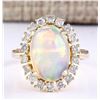 Image 1 : 4.77 CTW Natural Opal And Diamond Ring In 18K Yellow Gold