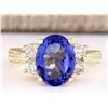 Image 1 : 4.10 CTW Natural Tanzanite And Diamond Ring In 18K Yellow Gold