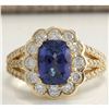 Image 1 : 3.65 CTW Natural Tanzanite And Diamond Ring In 14K Yellow Gold