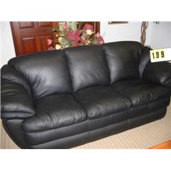 leather over stuffed sofa