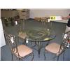 Image 1 : Wrought and glass dining table with 4 c