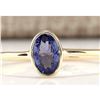 Image 1 : 0.60 CTW Natural Tanzanite And Diamond Ring In 18K Yellow Gold