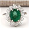 Image 1 : 4.20 CTW Natural Emerald And Diamond Ring In 18K White Gold