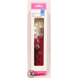 WOMENS DUAL FUNCTION/ BEADED VIBRATOR