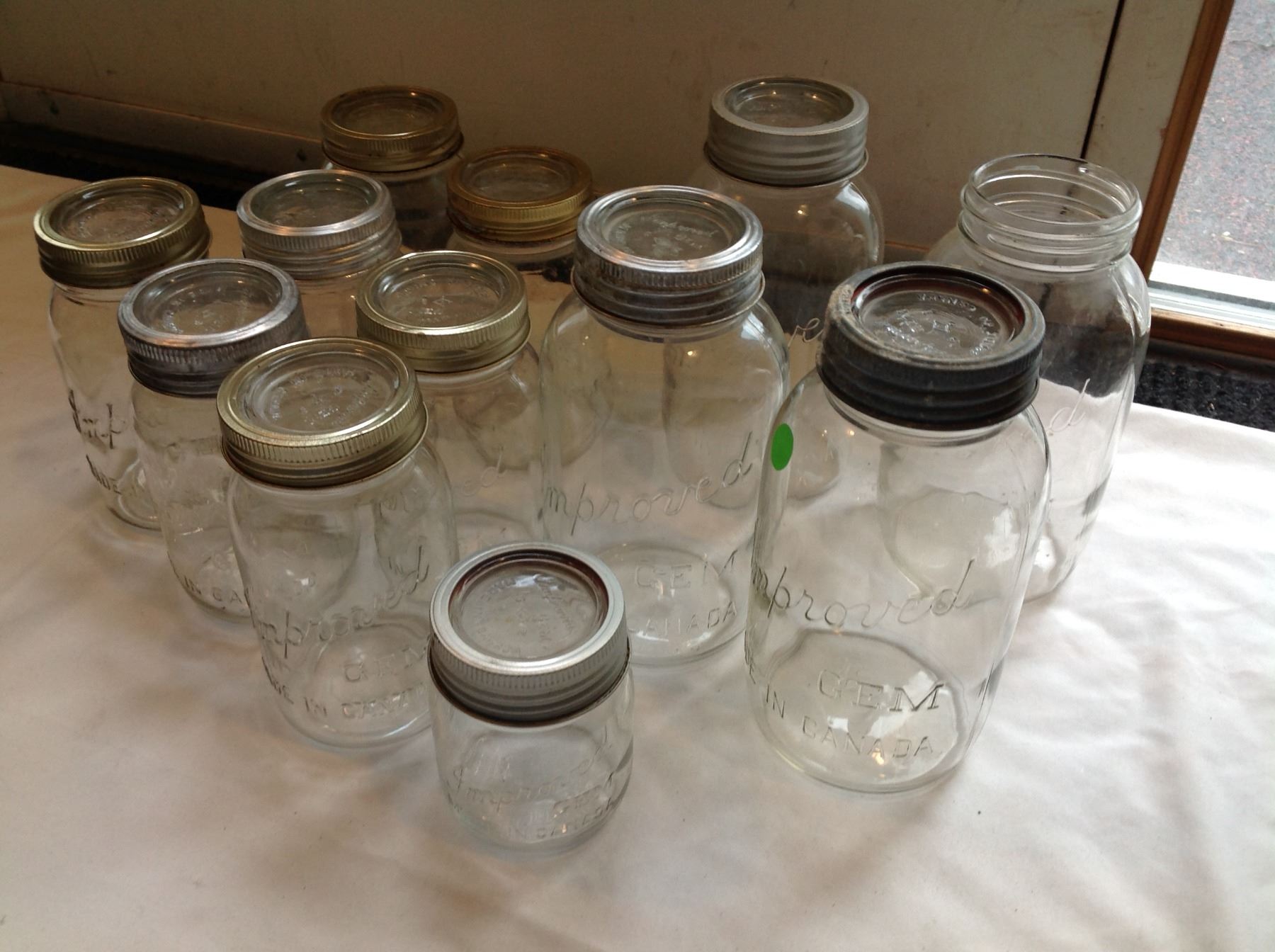 LOT OF 12 IMPERIAL GEM CANNING SEALERS WITH OLD GLASS INSERT LIDS