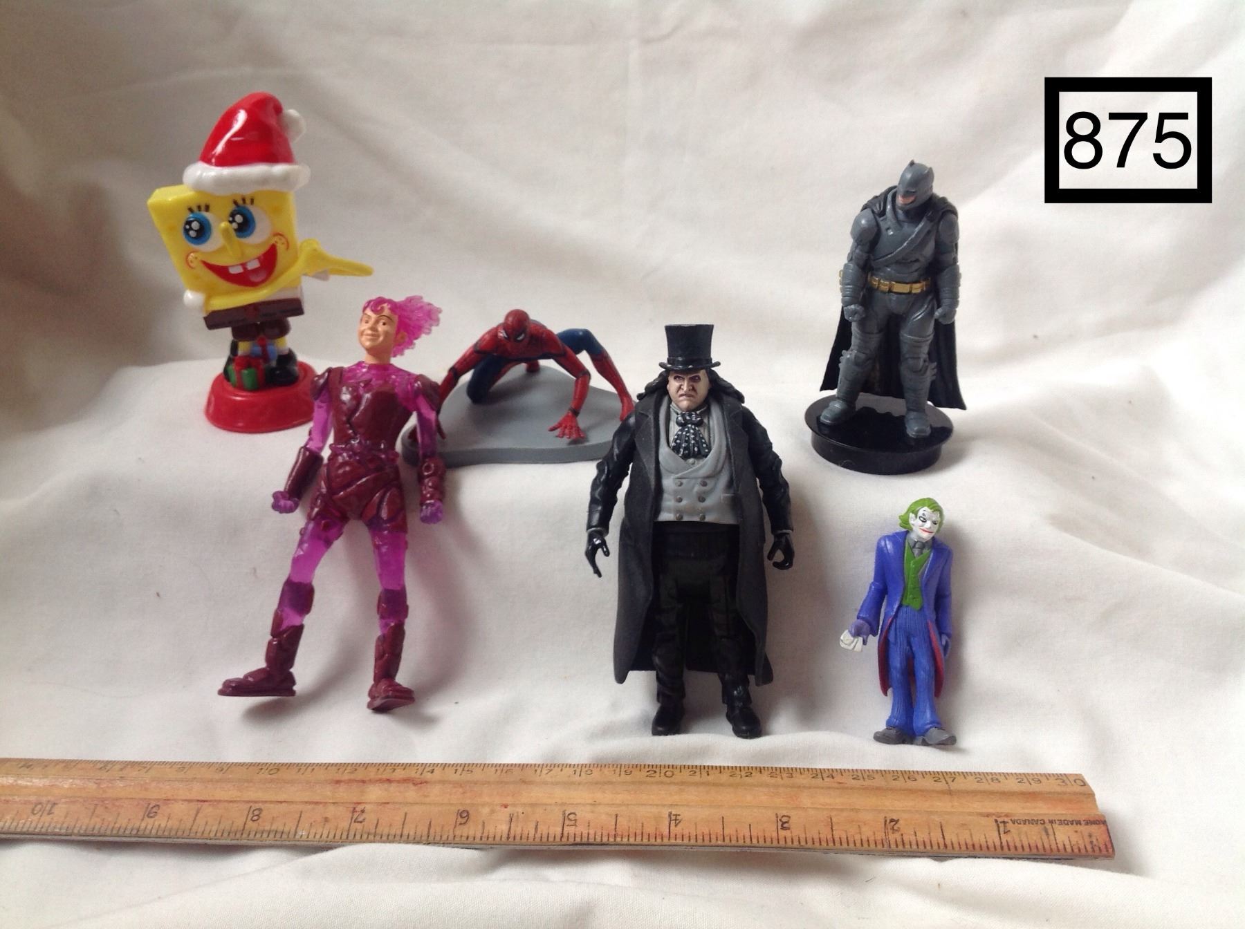 BAG OF HEROES & VILLAINS ACTION FIGURES. Schmalz Auctions