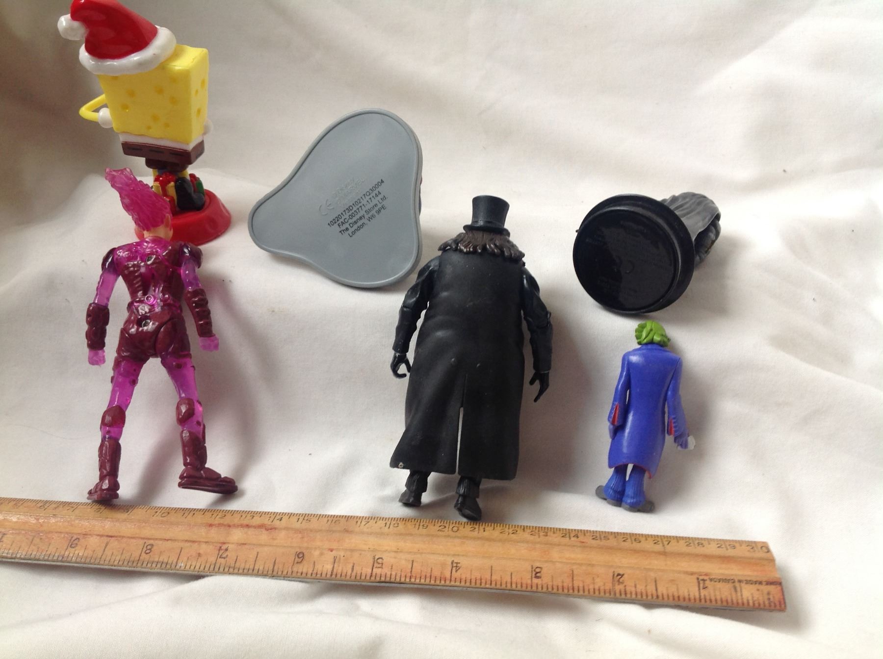 BAG OF HEROES & VILLAINS ACTION FIGURES. Schmalz Auctions