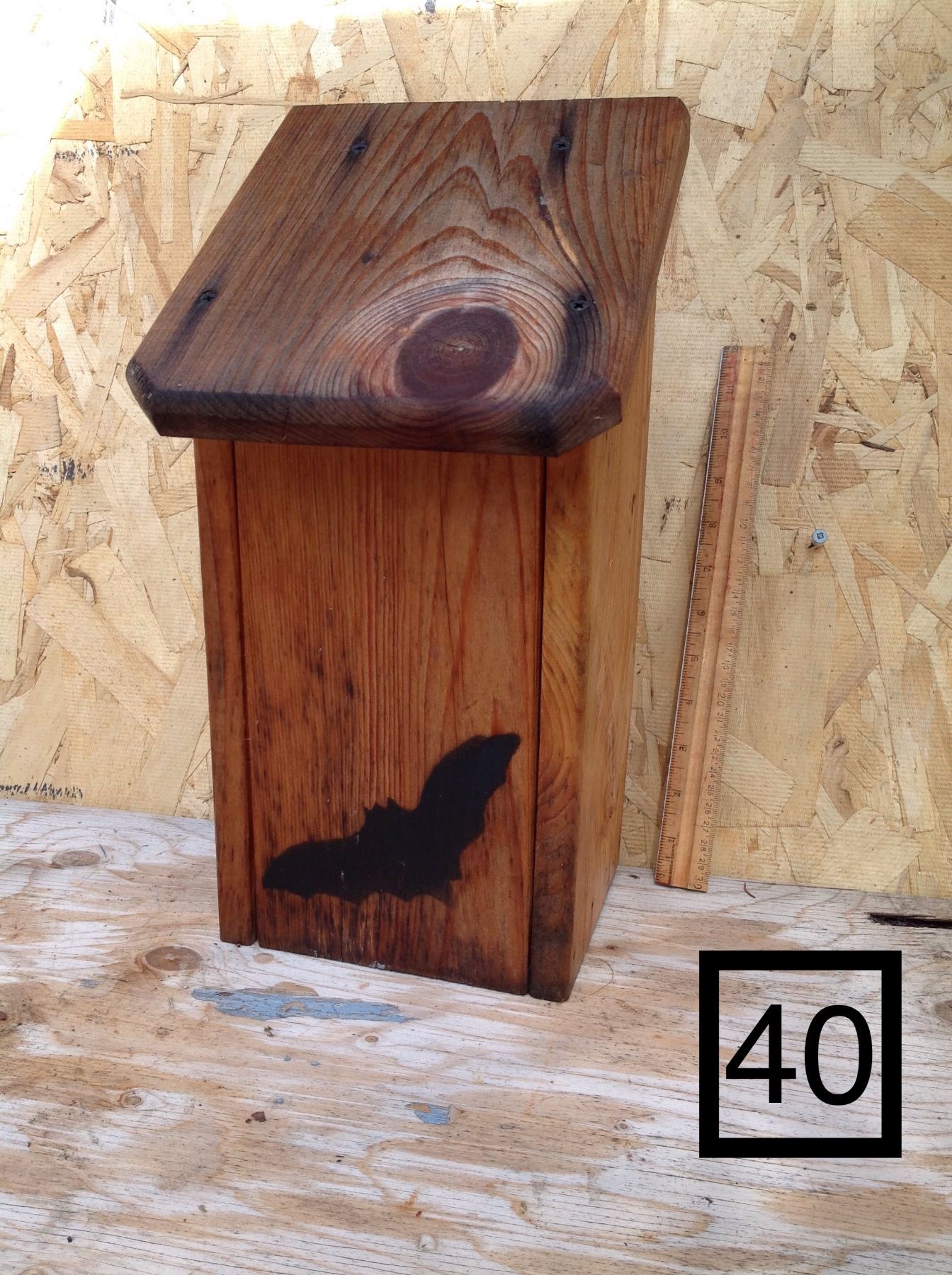 WOODEN BAT HOUSE. Schmalz Auctions