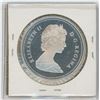 Image 2 : 1983 CANADA SILVER DOLLAR - WORLD UNIVERSITY GAMES - .375 TROY OZ SILVER