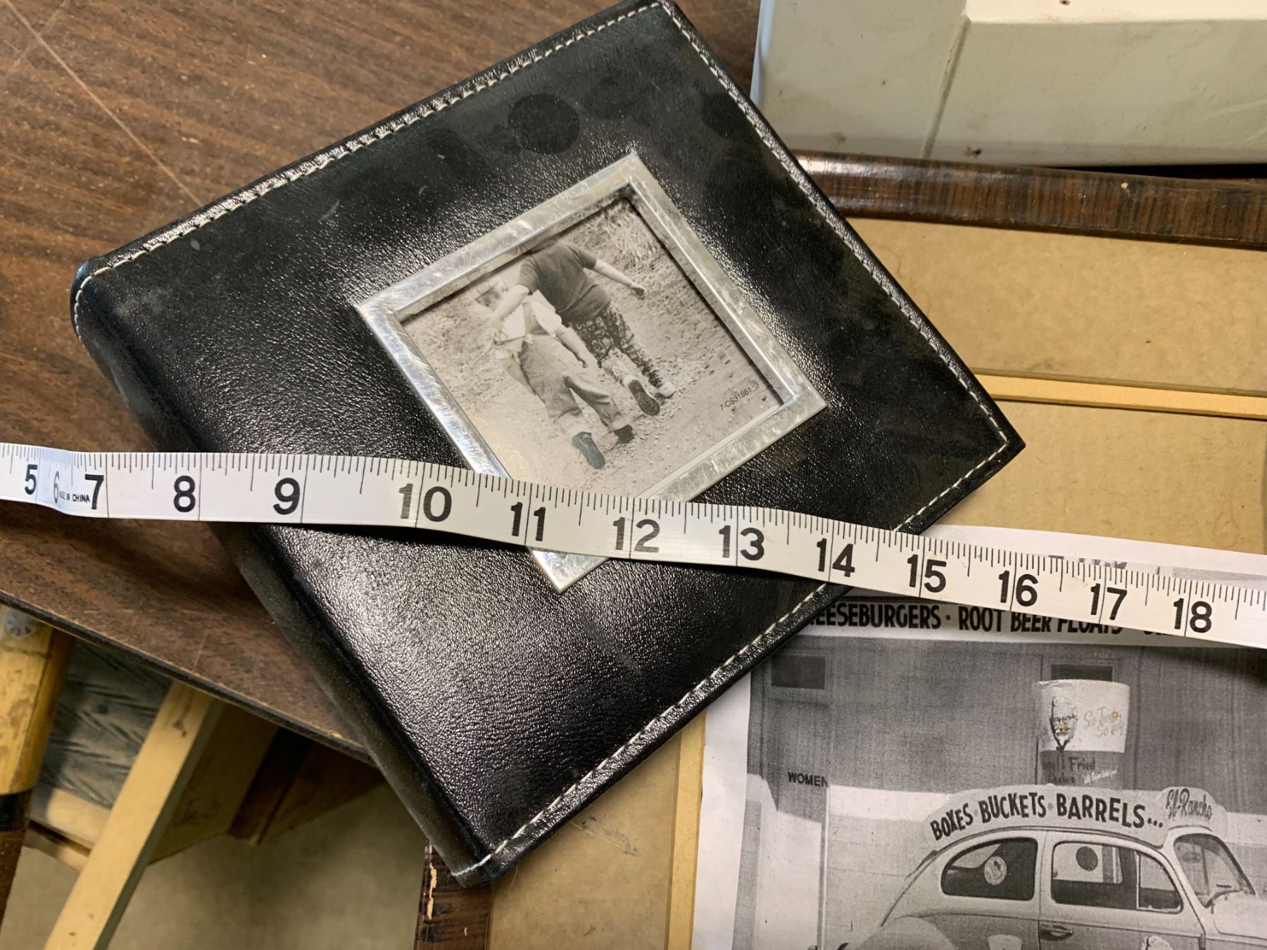 LOT OF WOODEN PICTURE FRAMES, PHOTO ALBUM, HOME HARDWARE DOG, ETC