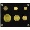 Image 2 : A six-piece gold set as follows: Peso 1915, KM16, UNC; A six-piece gold set as follows: